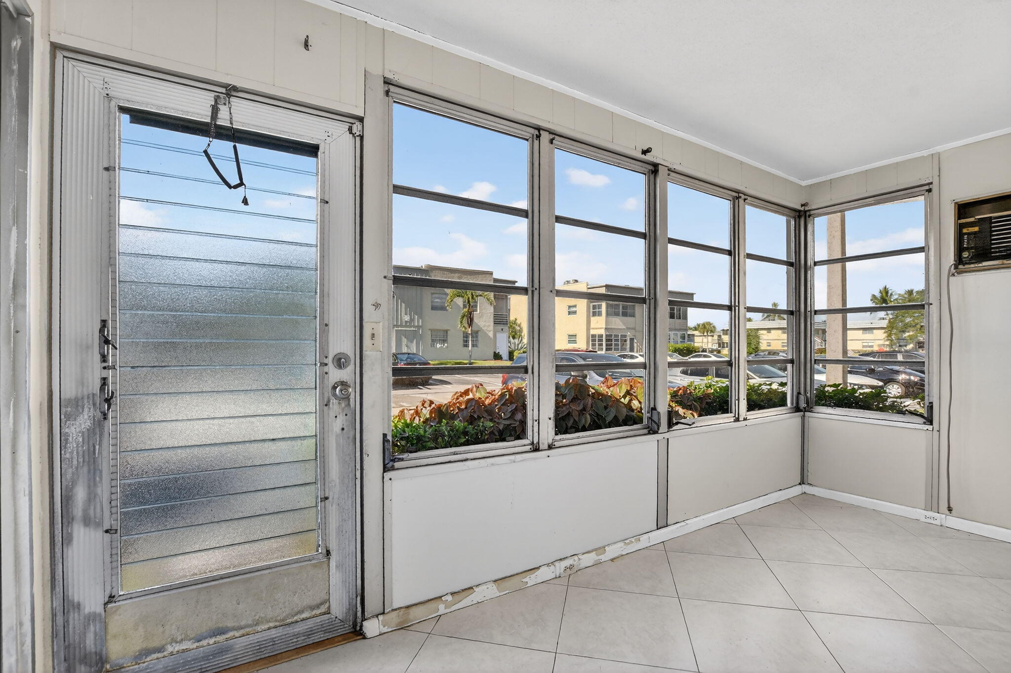 258 Monaco Way, Unit 258 Delray Beach, FL 33446 - Photo 14 of 78 enclosed porch
