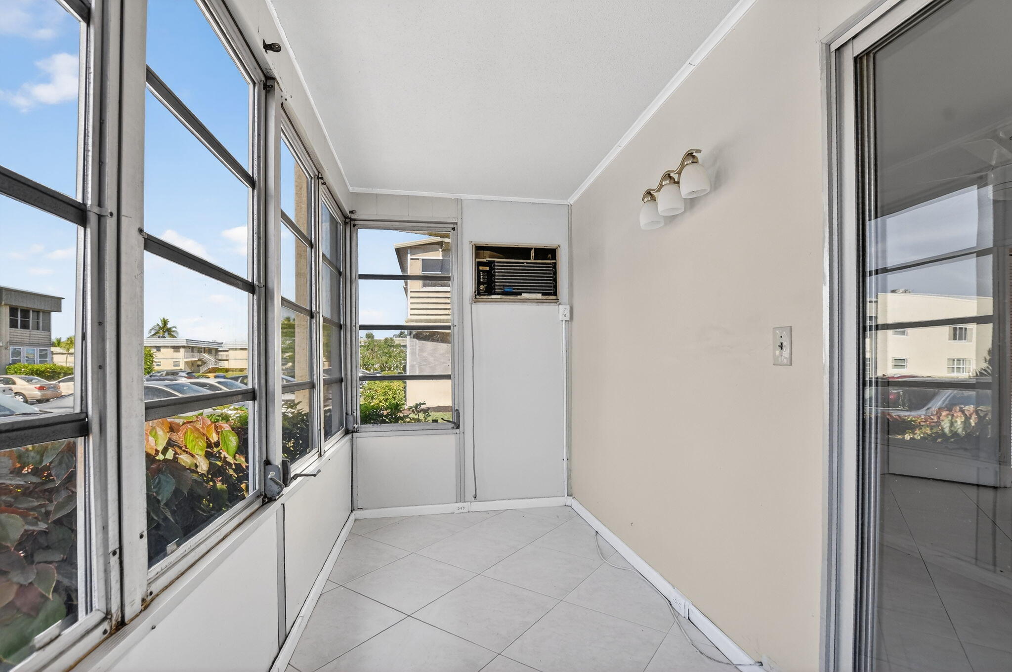 258 Monaco Way, Unit 258 Delray Beach, FL 33446 - Photo 15 of 78 enclosed porch