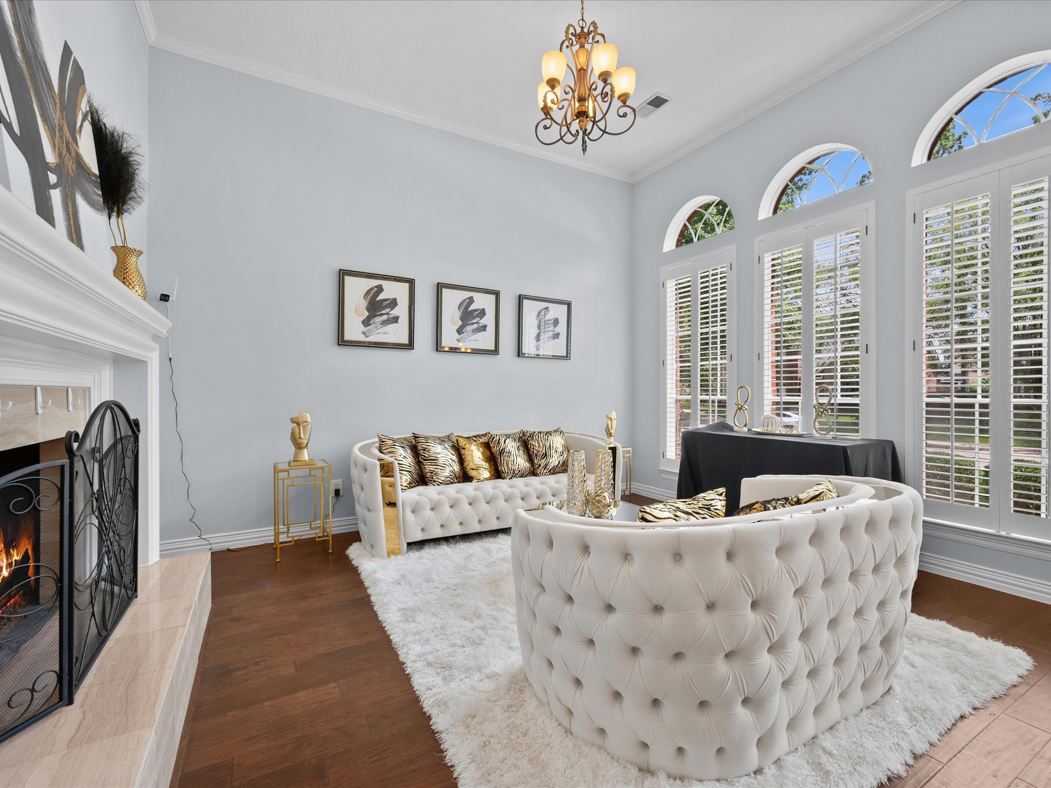 16123 Lafone Drive Spring, TX 77379 - Photo 12 of 47 Imagine welcoming guests for conversation by the fire, celebrating special occasions, or simply enjoying a quiet evening in this elegant and versatile gathering space.