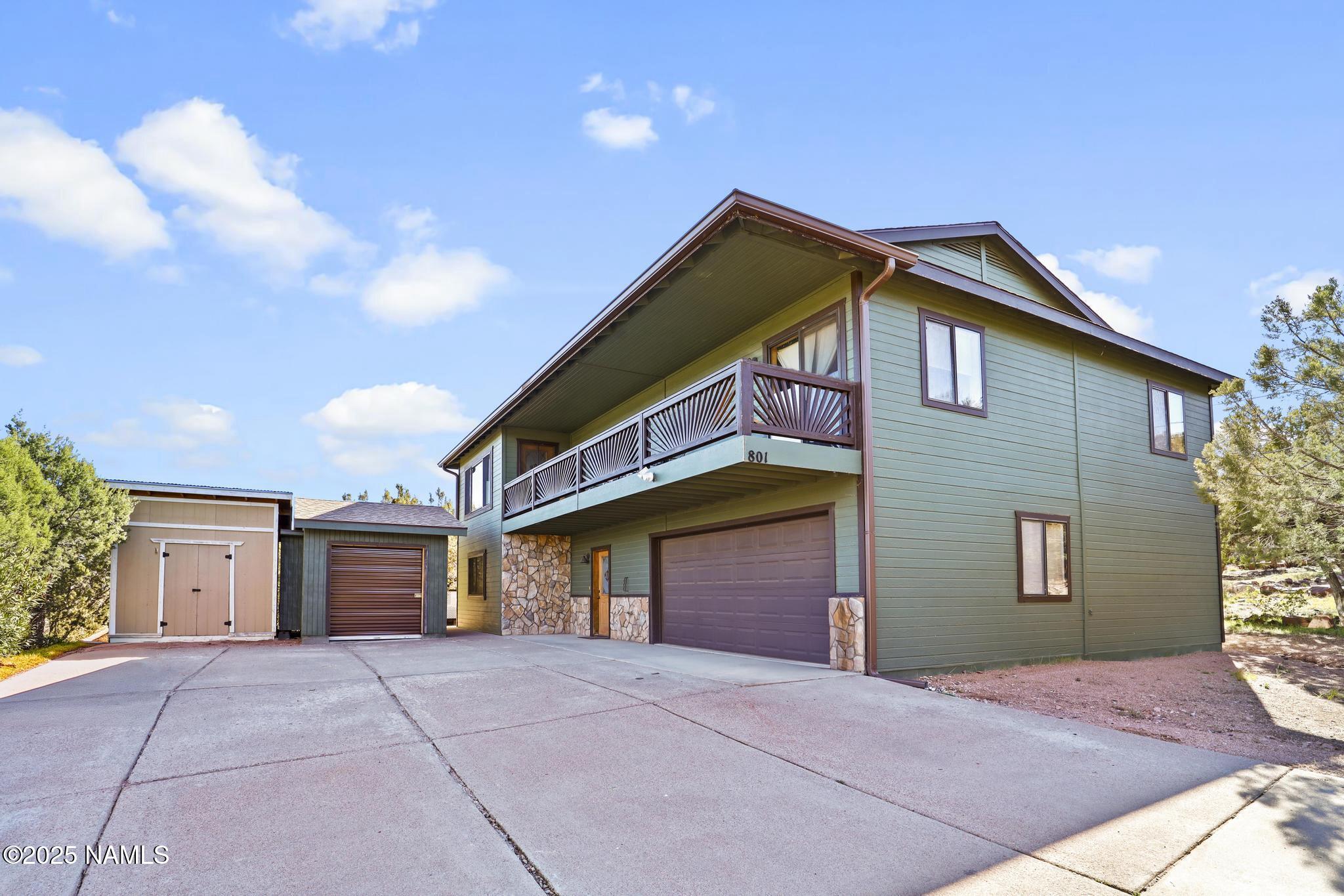 801 North Madison Drive Payson, AZ 85541 - Photo 1 of 50 a front view of a house with yard