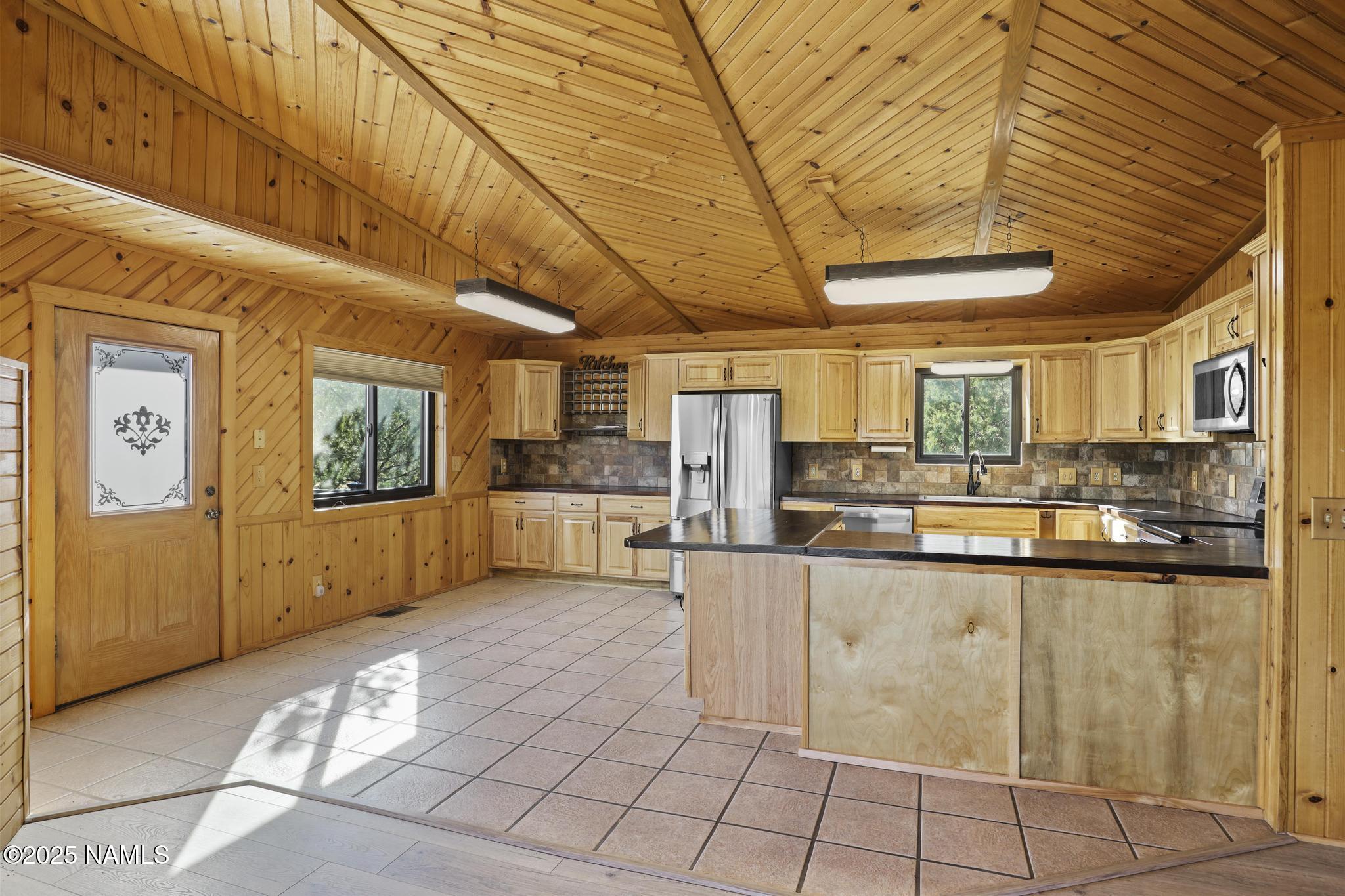 801 North Madison Drive Payson, AZ 85541 - Photo 15 of 50 a view of a kitchen with kitchen island granite countertop lots of counter top space