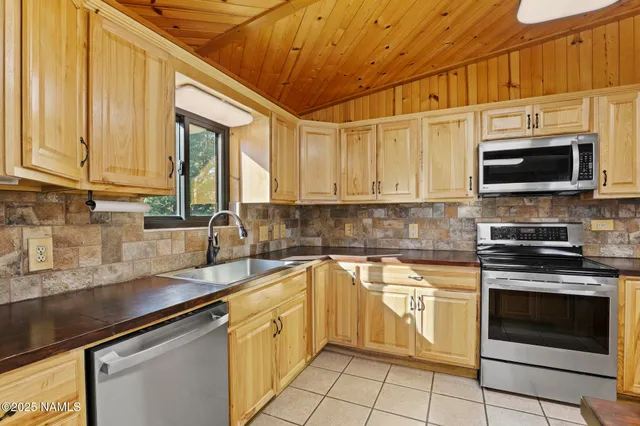 a view of a garage with rack and bicycle