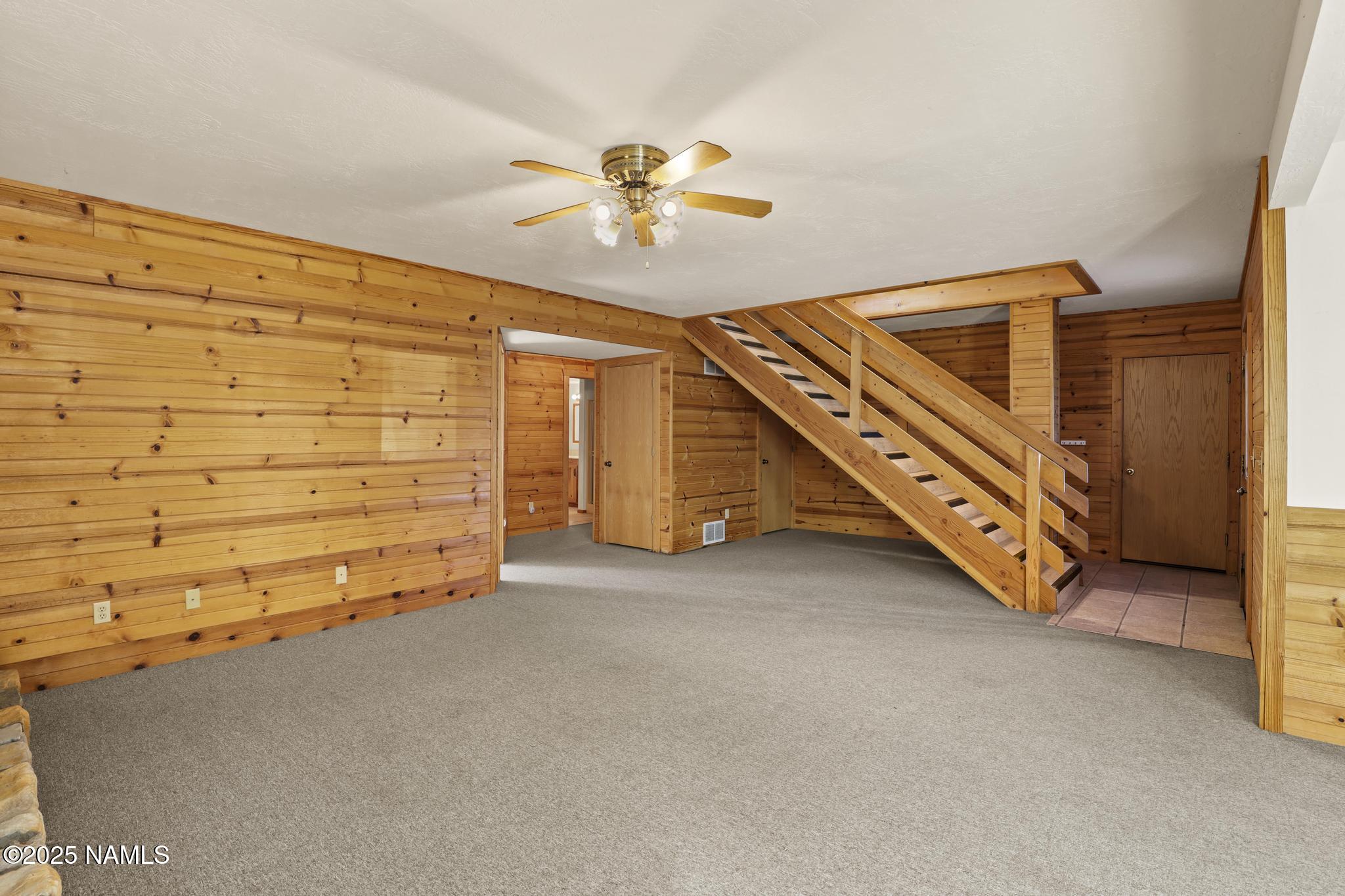 801 North Madison Drive Payson, AZ 85541 - Photo 36 of 50 a view of a livingroom with a staircase