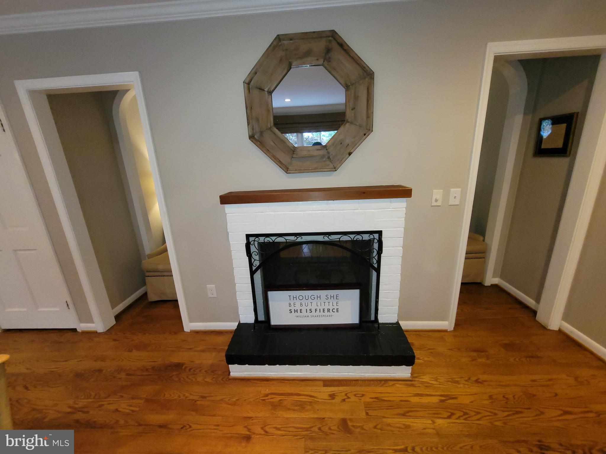 2424 Stanwick Road Phoenix, MD 21131 - Photo 15 of 67 a living room with a fireplace and a rug