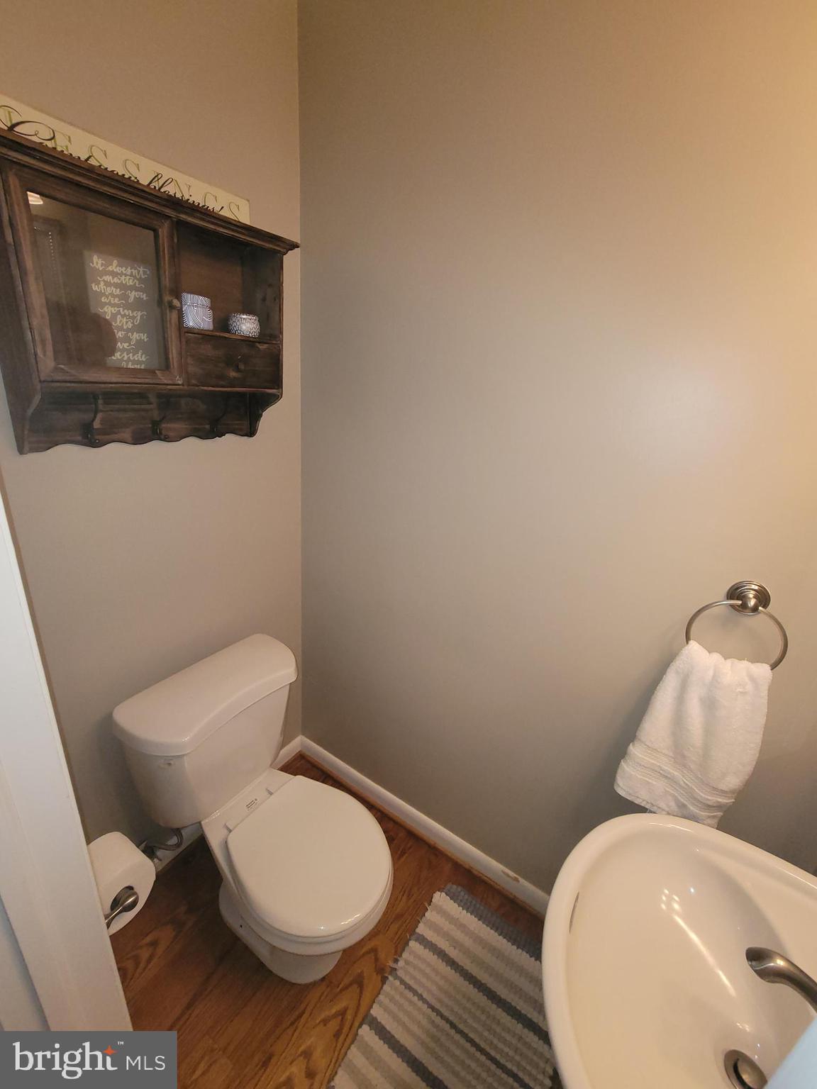 2424 Stanwick Road Phoenix, MD 21131 - Photo 25 of 67 a bathroom with a toilet and a sink
