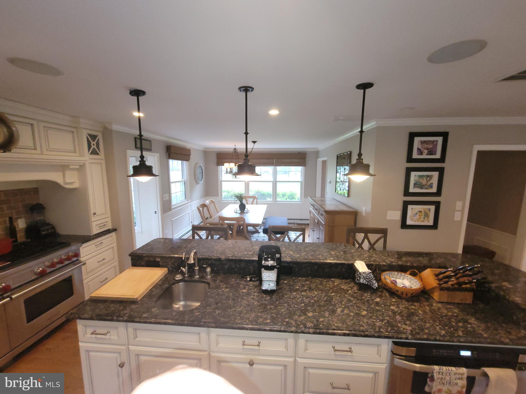 2424 Stanwick Road Phoenix, MD 21131 - Photo 5 of 67 a kitchen with sink stove and cabinets