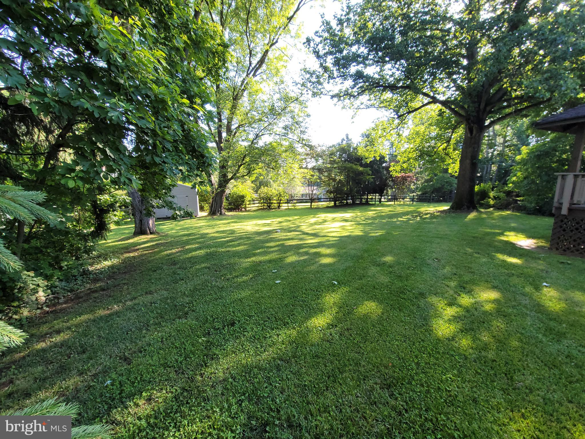 2424 Stanwick Road Phoenix, MD 21131 - Photo 63 of 67 a big yard with lots of green space and trees