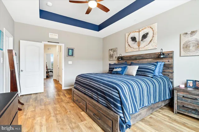 a bedroom with double bed and a walk in closet