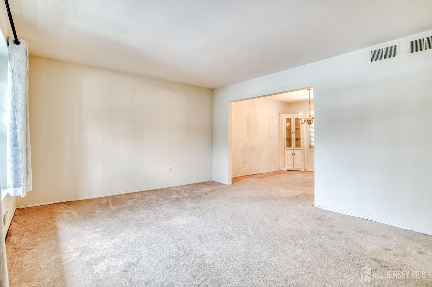 61 Ochs Avenue Milltown, NJ 08850 - Photo 3 of 29 a view of an empty room