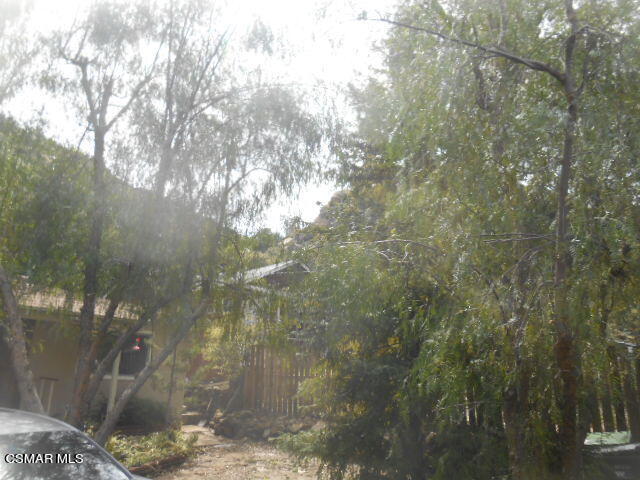 1123 Katherine Road Simi Valley, CA 93063 - Photo 1 of 10 a view of a forest of a house