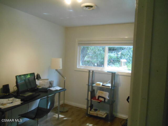 1123 Katherine Road Simi Valley, CA 93063 - Photo 8 of 10 a view of a workspace with furniture and a window