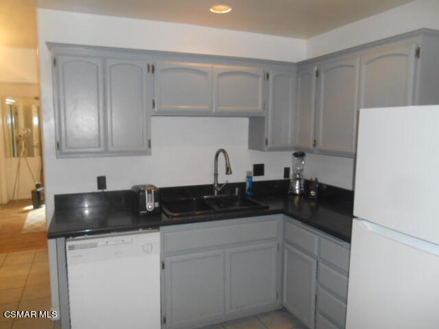 1123 Katherine Road Simi Valley, CA 93063 - Photo 10 of 10 a kitchen with a sink and cabinets