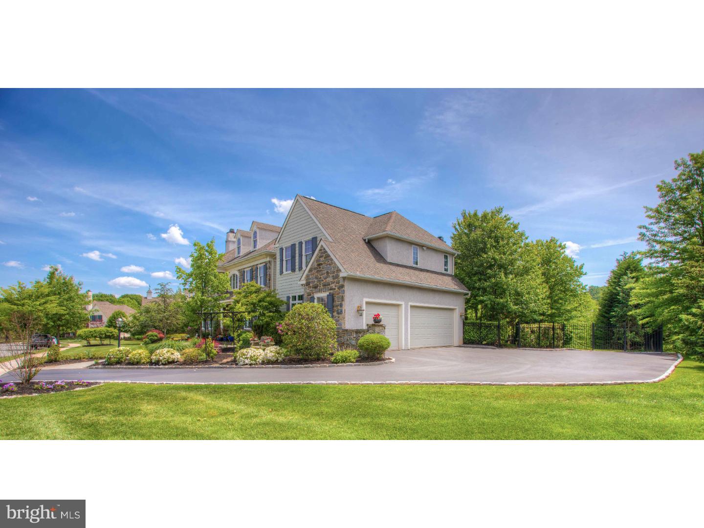 1033 Whitegate Road Wayne, PA 19087 - Photo 2 of 23 a front view of a house with a yard