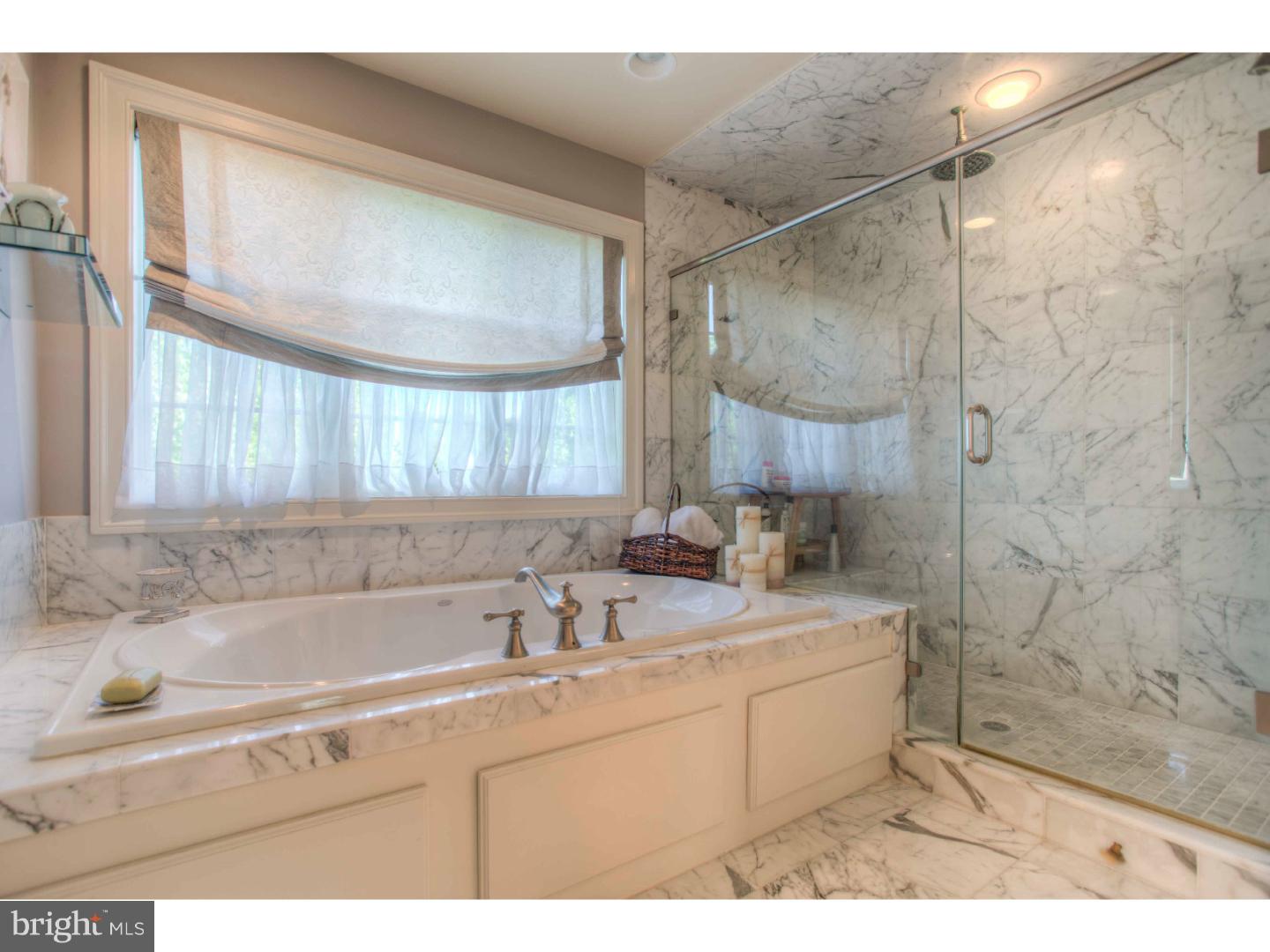 1033 Whitegate Road Wayne, PA 19087 - Photo 13 of 23 a bathroom with a sink and a bathtub