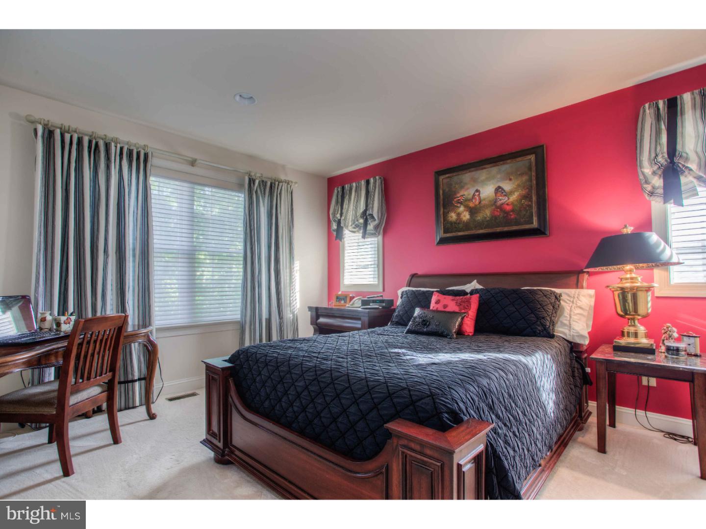 1033 Whitegate Road Wayne, PA 19087 - Photo 19 of 23 a bedroom with a bed and a dresser next to a window