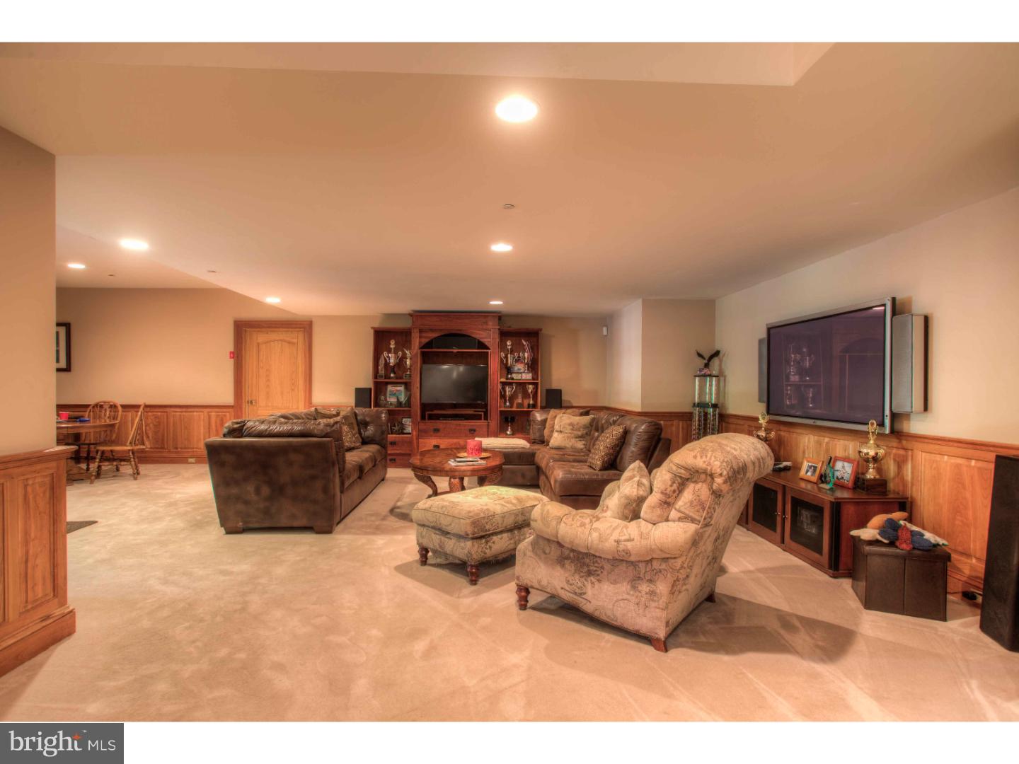 1033 Whitegate Road Wayne, PA 19087 - Photo 20 of 23 a living room with furniture and a flat screen tv