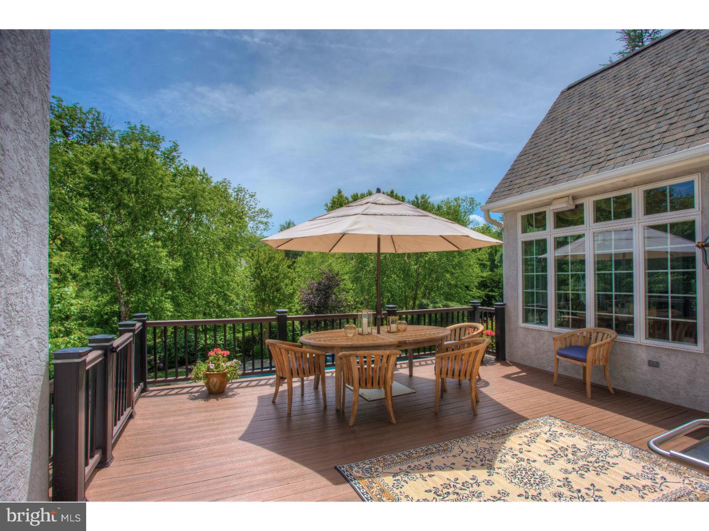 1033 Whitegate Road Wayne, PA 19087 - Photo 23 of 23 a patio with glass top table and chairs