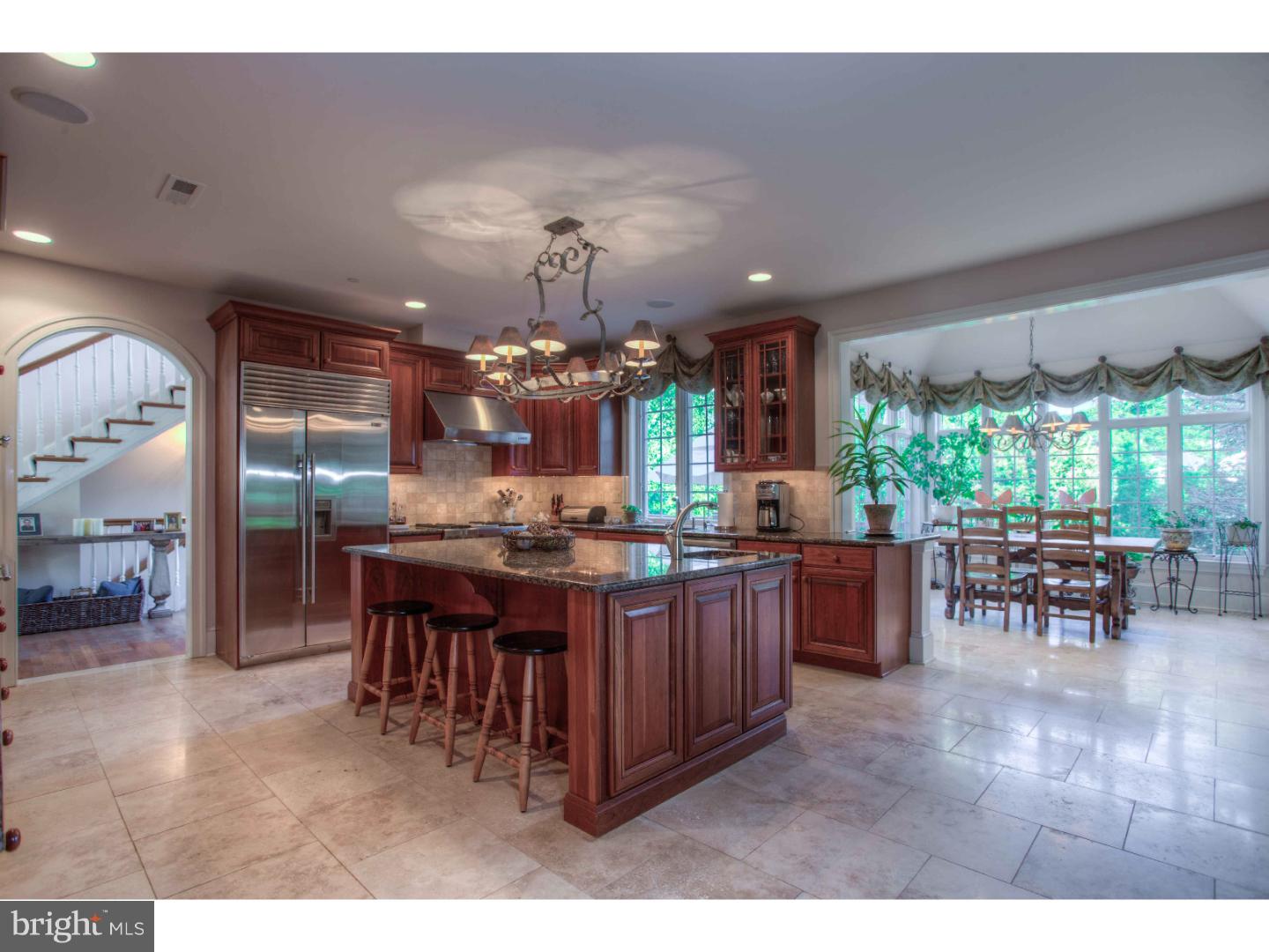 1033 Whitegate Road Wayne, PA 19087 - Photo 5 of 23 a kitchen with lots of counter top space dining table and chairs