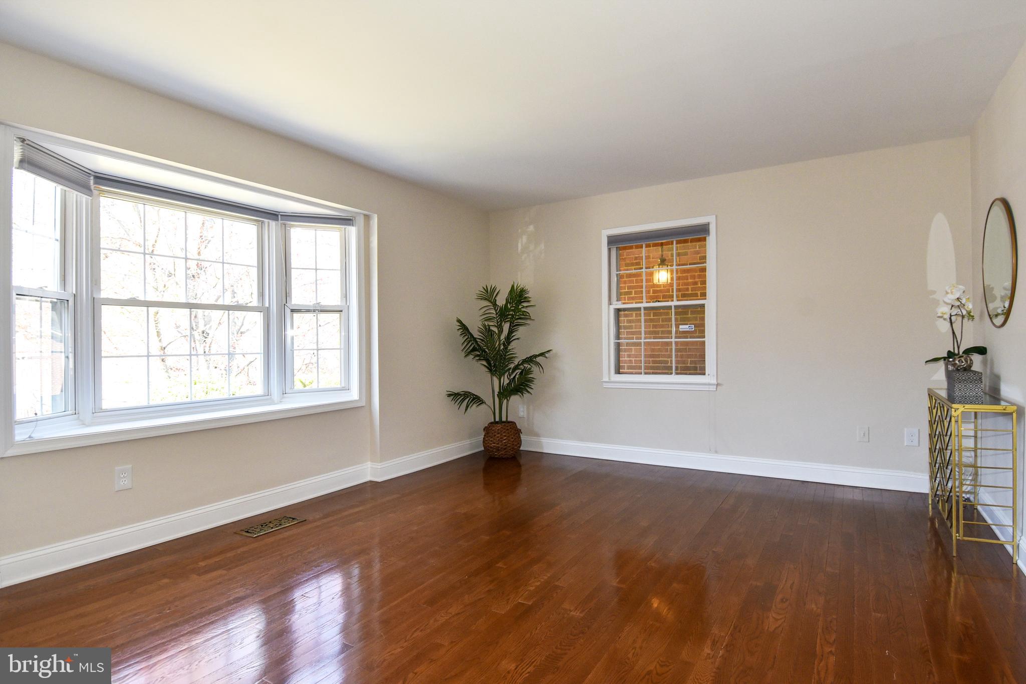 3249 Victor Circle Annandale, VA 22003 - Photo 4 of 33 Living Room with Window that oversees Brick Arch