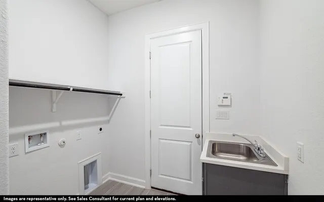 a bathroom with a sink and mirror
