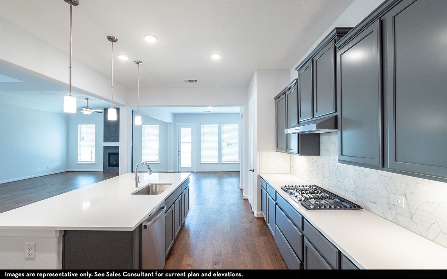 602 Johnston Drive Rosharon, TX 77583 - Photo 4 of 21 a kitchen with kitchen island a sink stove and refrigerator