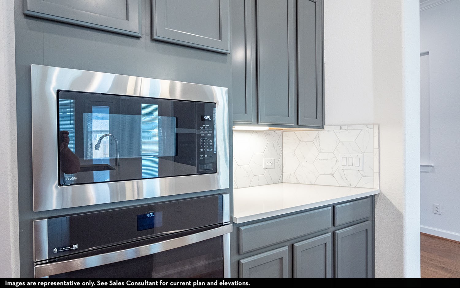 602 Johnston Drive Rosharon, TX 77583 - Photo 7 of 21 a kitchen with a sink and cabinets