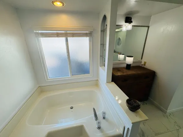 a bathroom with a bathtub