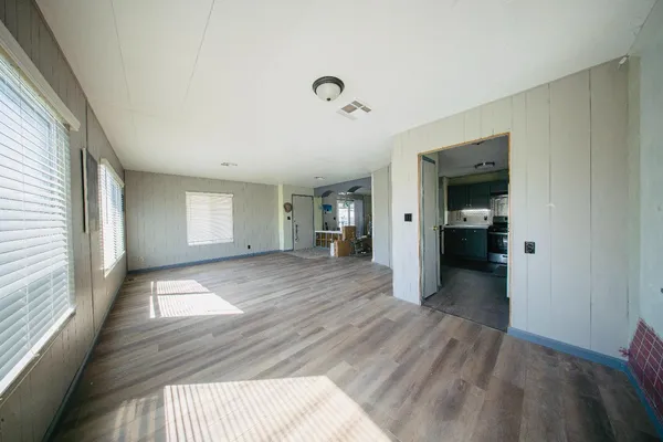 a view of a livingroom with furniture a fireplace