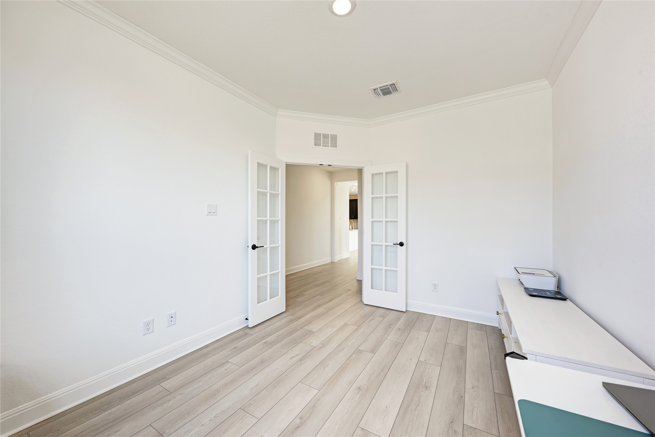 316 Regatta Trail Leander, TX 78641 - Photo 5 of 39 Bright interior space featuring light wood-finish flooring