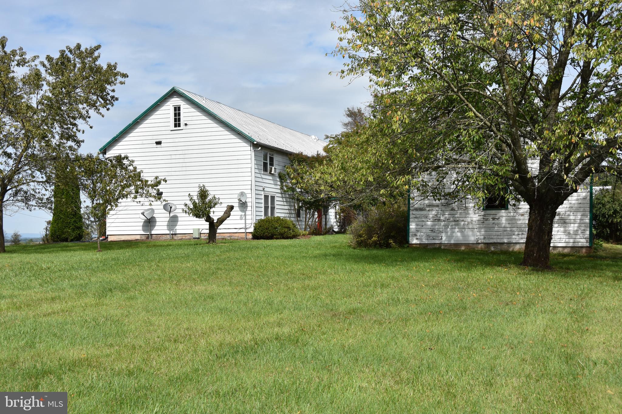 1771 Keysville Road South, Unit 1765 Keymar, MD 21757 - Photo 53 of 75 OPEN SPACE AREA SIDE APARTMENT BUILDING