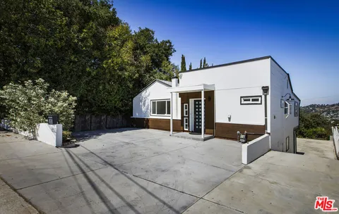 a view of a house with a outdoor space