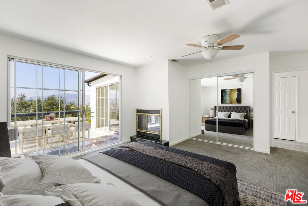 4013 Division Street Los Angeles, CA 90065 - Photo 22 of 66 a bedroom with a large bed and a large window