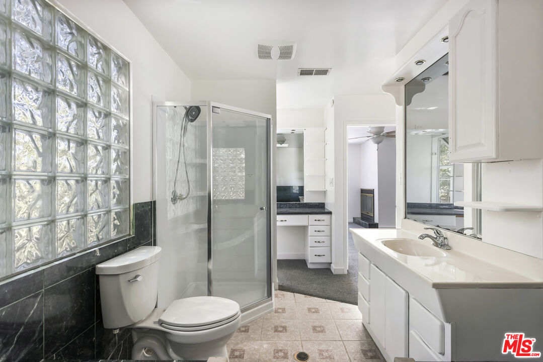 4013 Division Street Los Angeles, CA 90065 - Photo 31 of 66 a bathroom with a double vanity sink toilet and shower