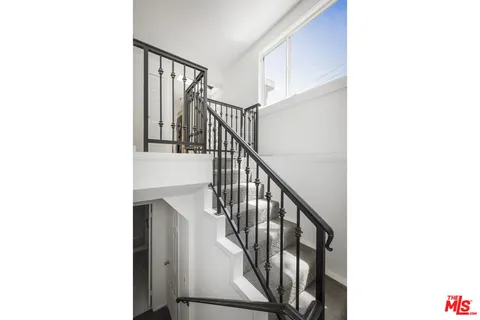 a view of a livingroom and hardwood floor