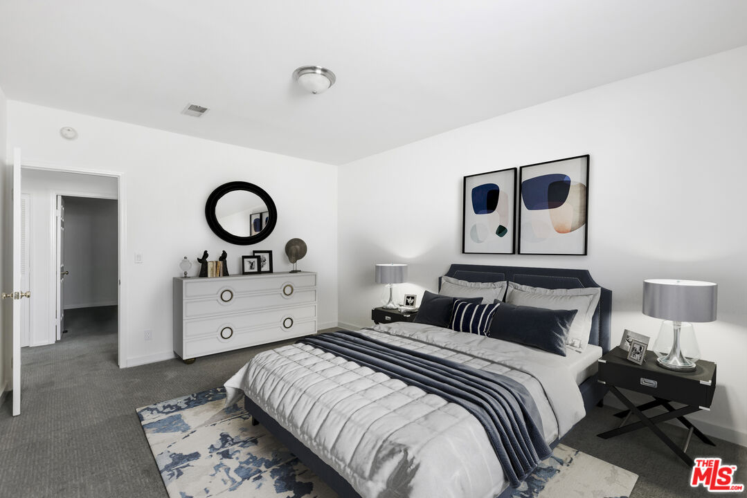4013 Division Street Los Angeles, CA 90065 - Photo 38 of 66 a bedroom with a bed and a dresser