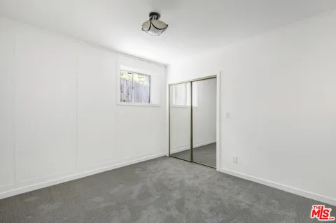 an empty room with closet