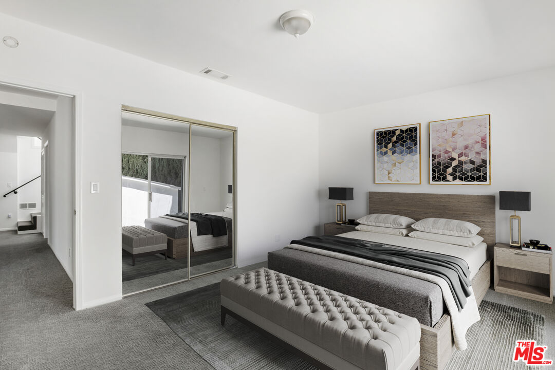 4013 Division Street Los Angeles, CA 90065 - Photo 46 of 66 a bedroom with a bed and a chair