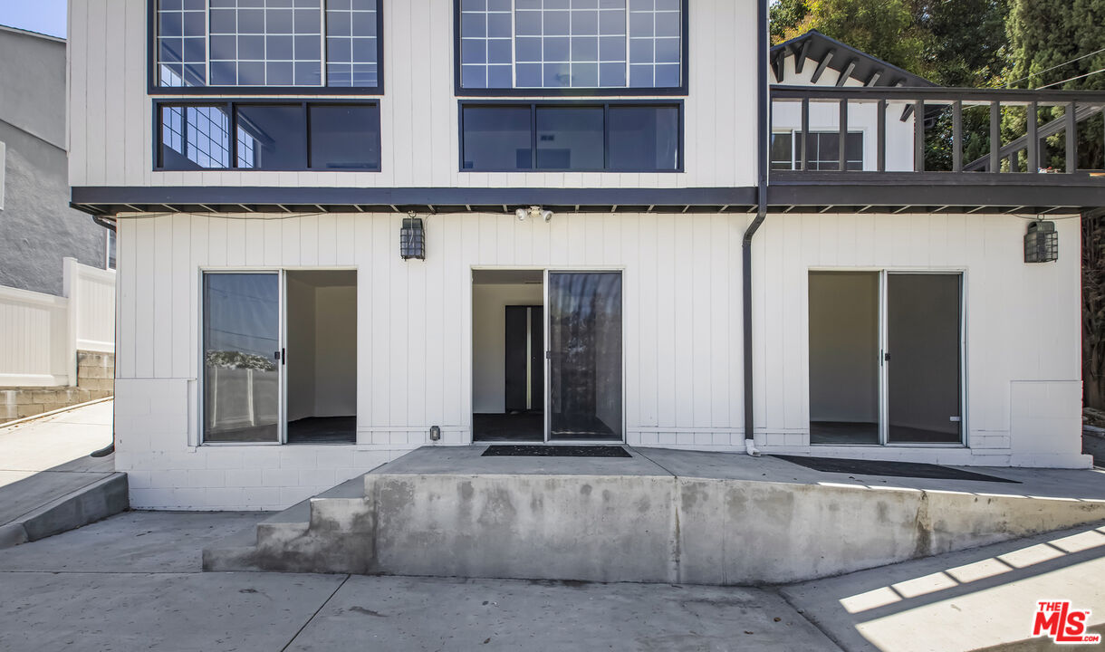 4013 Division Street Los Angeles, CA 90065 - Photo 59 of 66 front view of a house with large windows