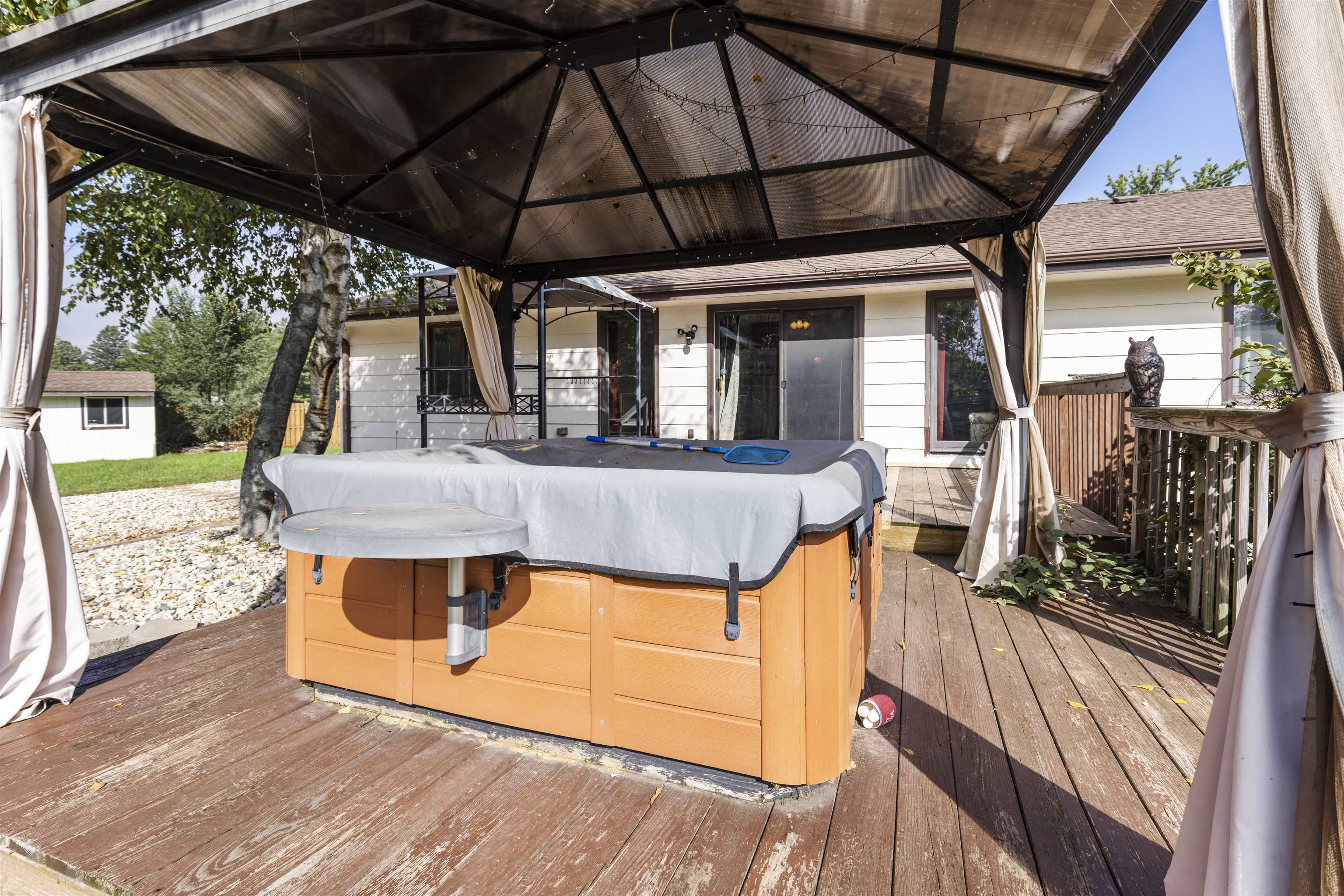 4031 Fairfax Road Roscoe, IL 61073 - Photo 17 of 23 a view of a porch with furniture and a yard