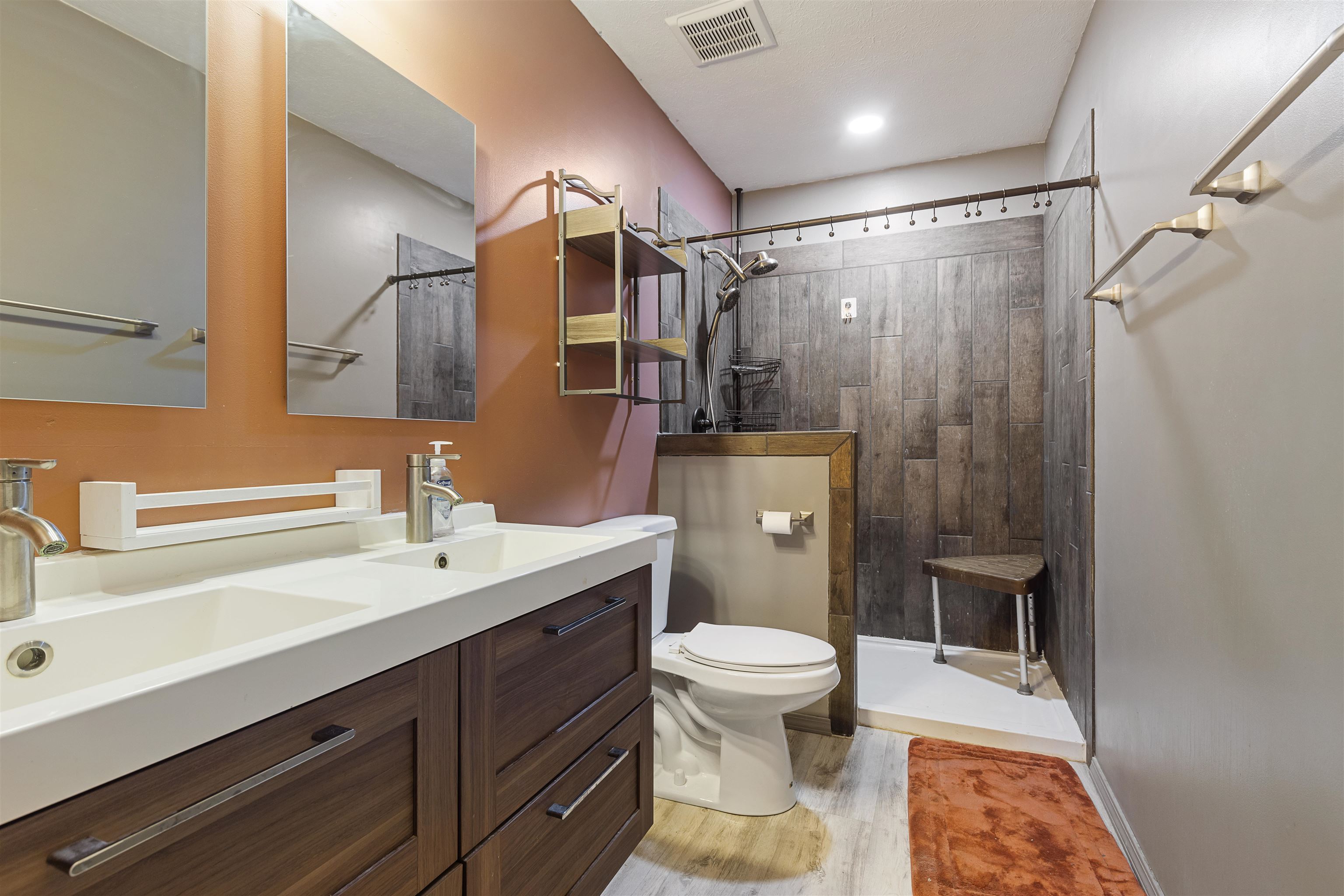 4031 Fairfax Road Roscoe, IL 61073 - Photo 8 of 23 a bathroom with a sink toilet and shower