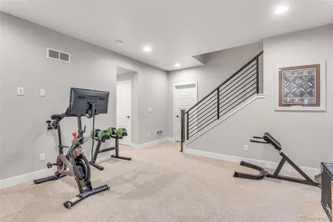 a view of a room with gym equipment