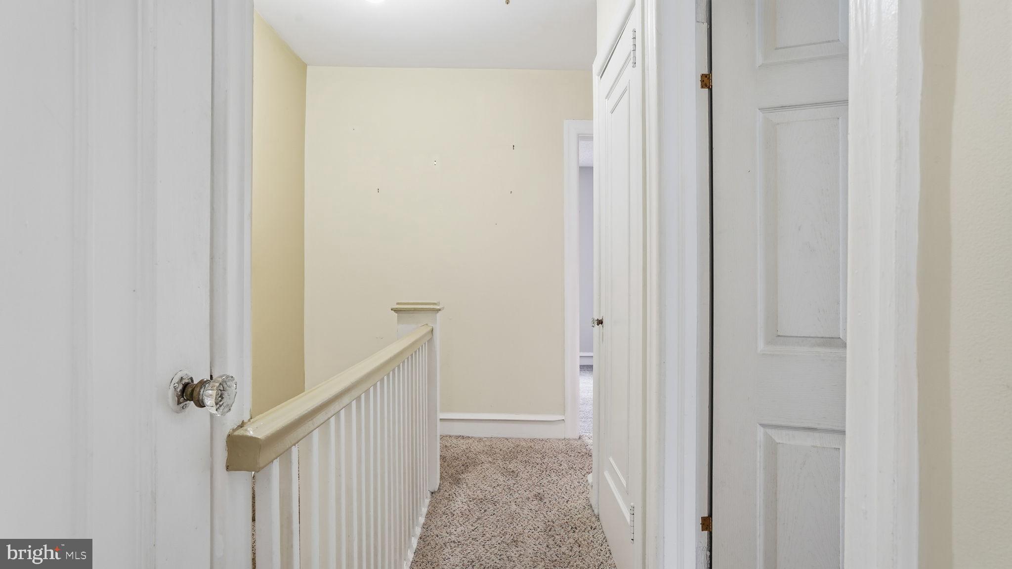 442 Wellesley Road Philadelphia, PA 19119 - Photo 20 of 36 a view of a hallway with stairs