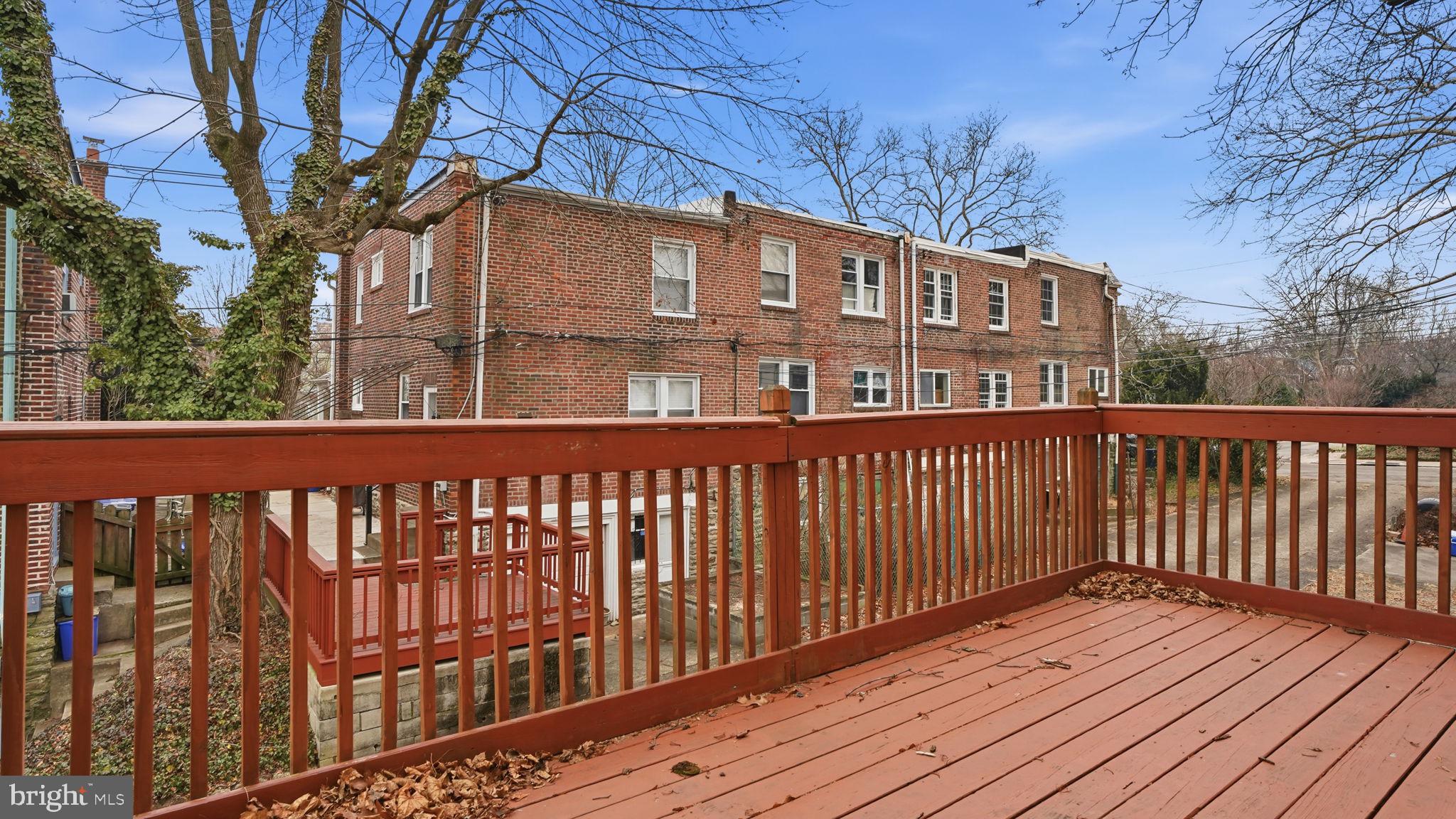 442 Wellesley Road Philadelphia, PA 19119 - Photo 33 of 36 a view of a brick building from a balcony