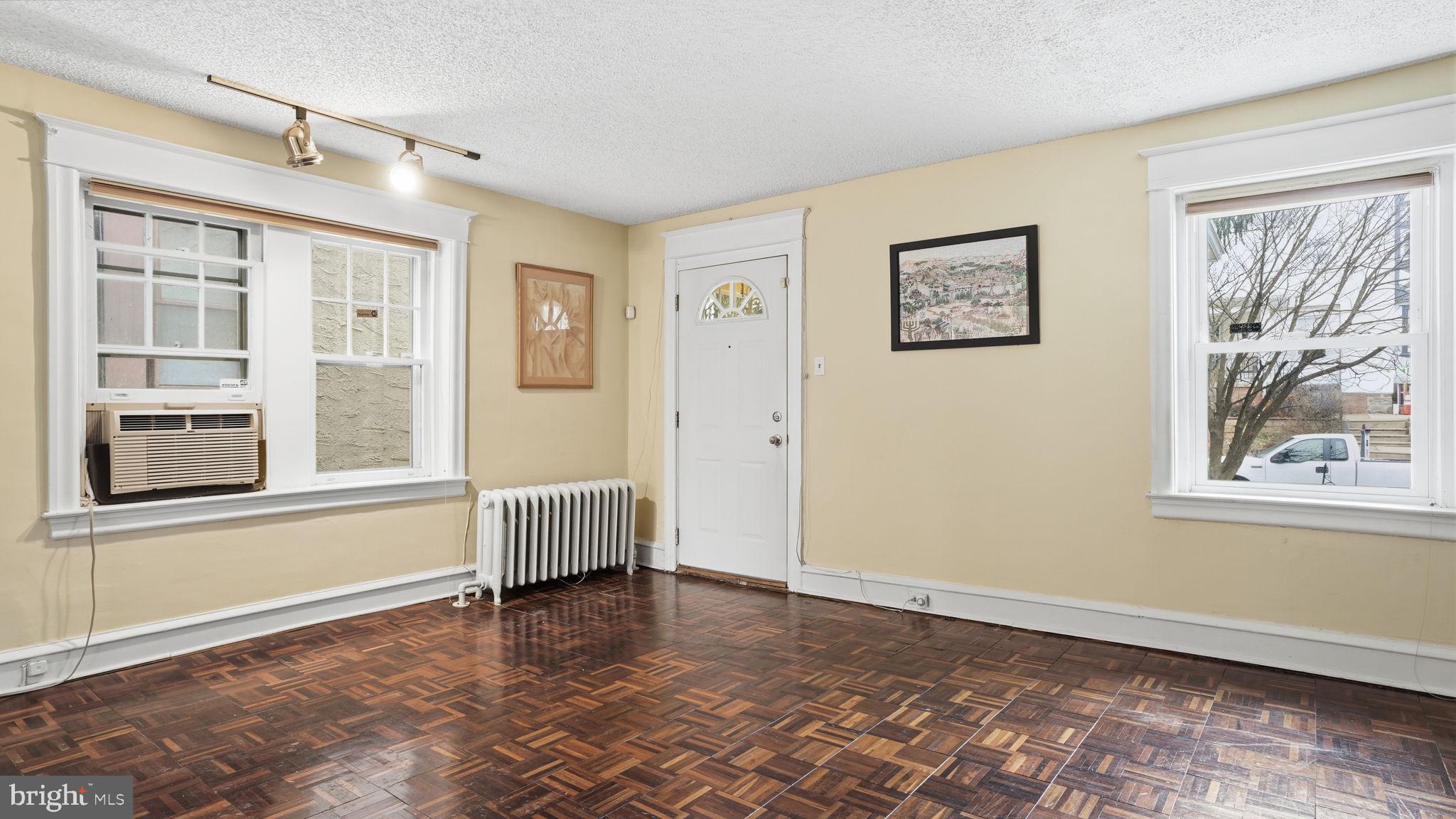 442 Wellesley Road Philadelphia, PA 19119 - Photo 6 of 36 a view of an empty room with a window