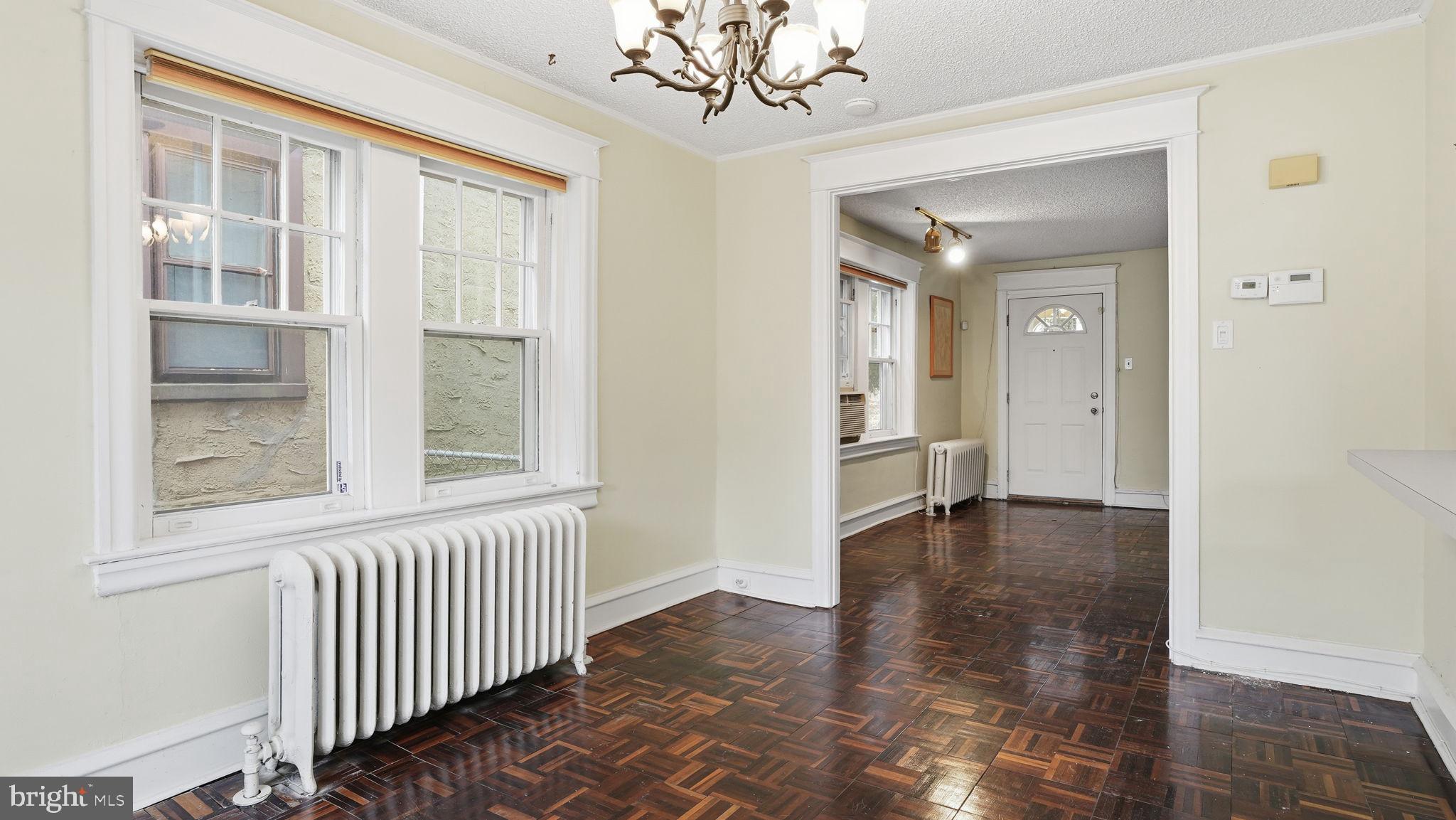 442 Wellesley Road Philadelphia, PA 19119 - Photo 10 of 36 wooden floor in a room with a window