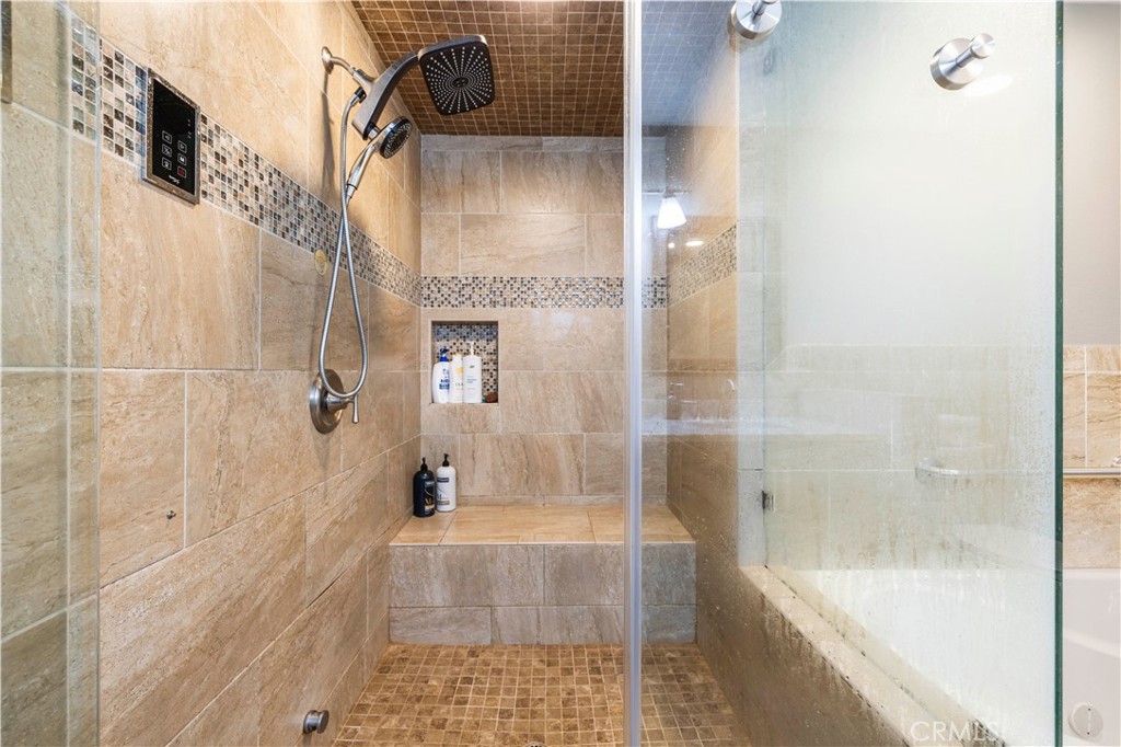 18770 Tribune Street Porter Ranch, CA 91326 - Photo 21 of 30 a bathroom with a shower