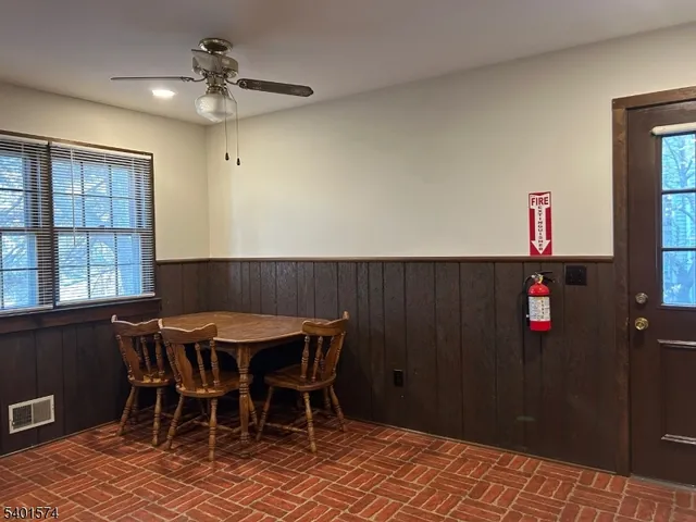 a view of a dining room with furniture