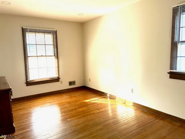a bathroom with a sink a toilet and bathtub