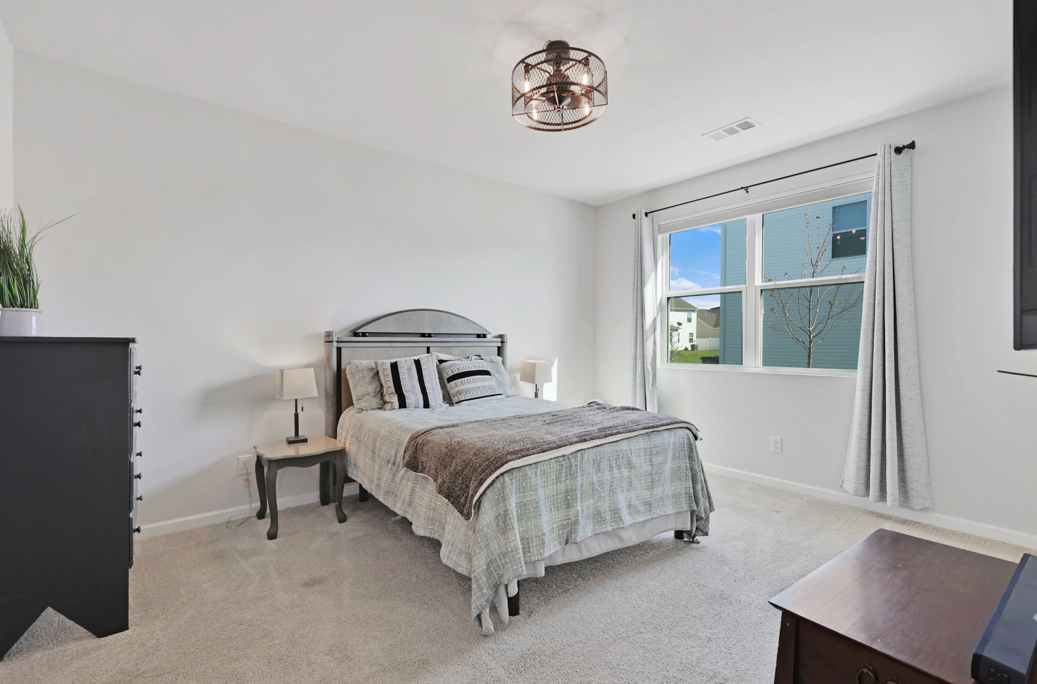 7764 Stapleton Chase Drive Antioch, TN 37013 - Photo 13 of 31 a bedroom with a bed and a window