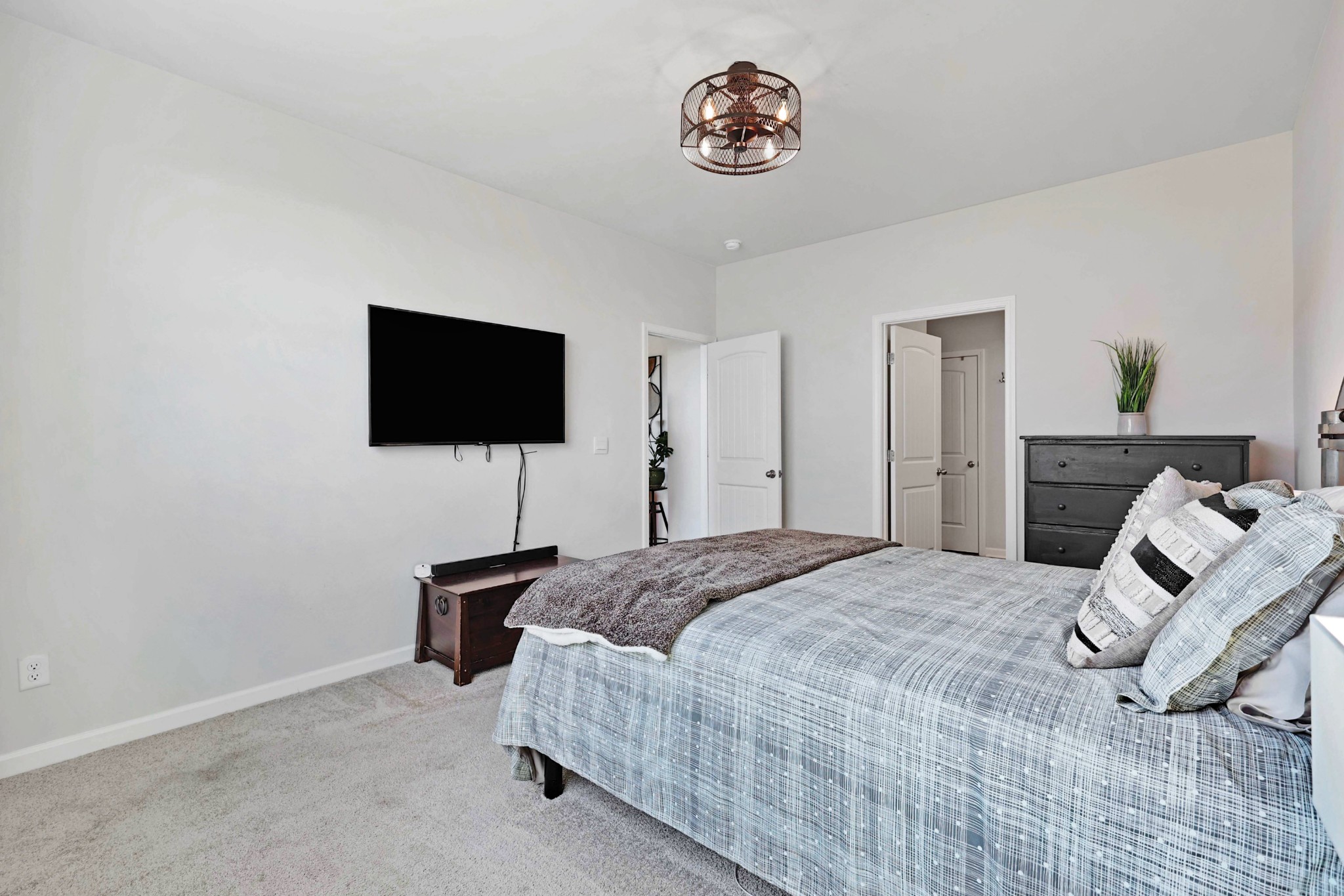 7764 Stapleton Chase Drive Antioch, TN 37013 - Photo 15 of 31 a bedroom with a bed and a flat screen tv